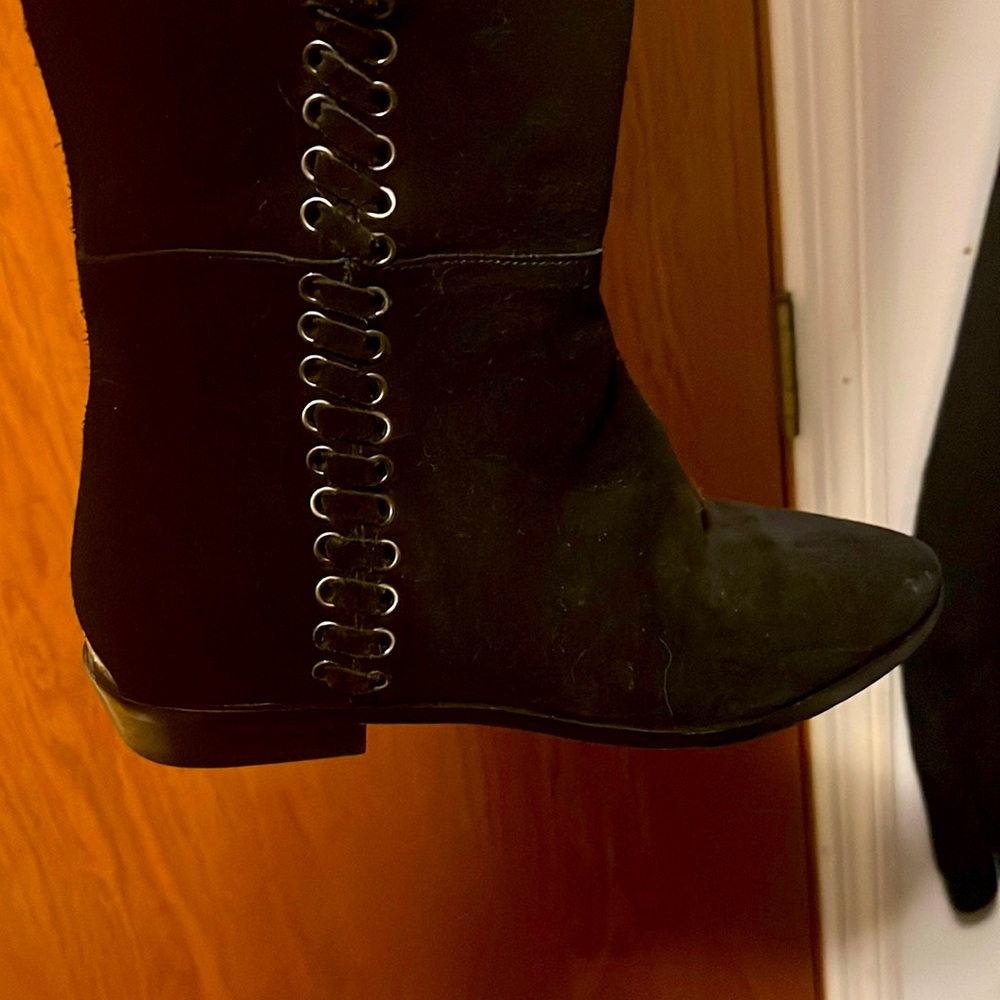 MK black boots above knee